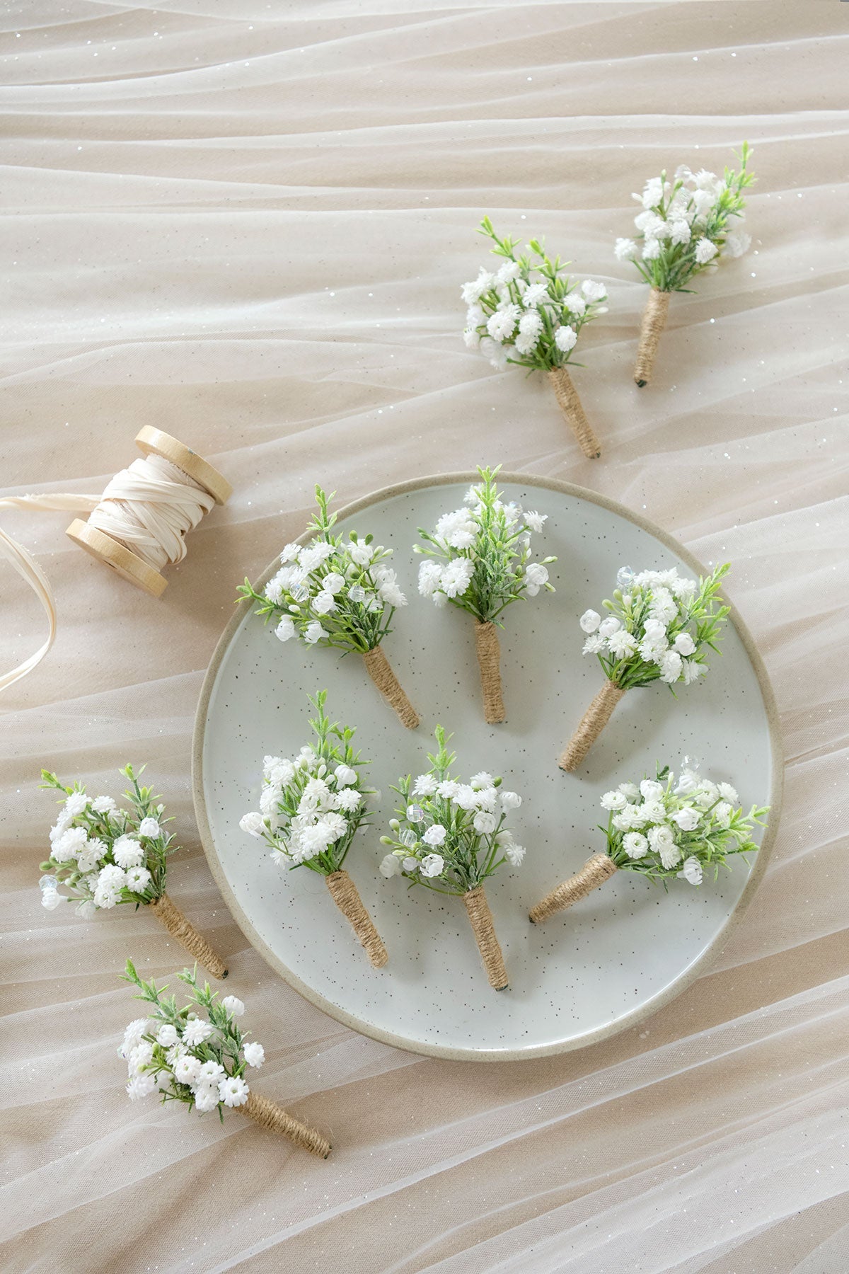Boutonnieres for Guests in Baby's Breath